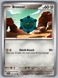 Bronzor Common SV08: Surging Sparks 126/191 NM 2024